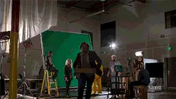 gif of man tripping and spilling things he was carrying