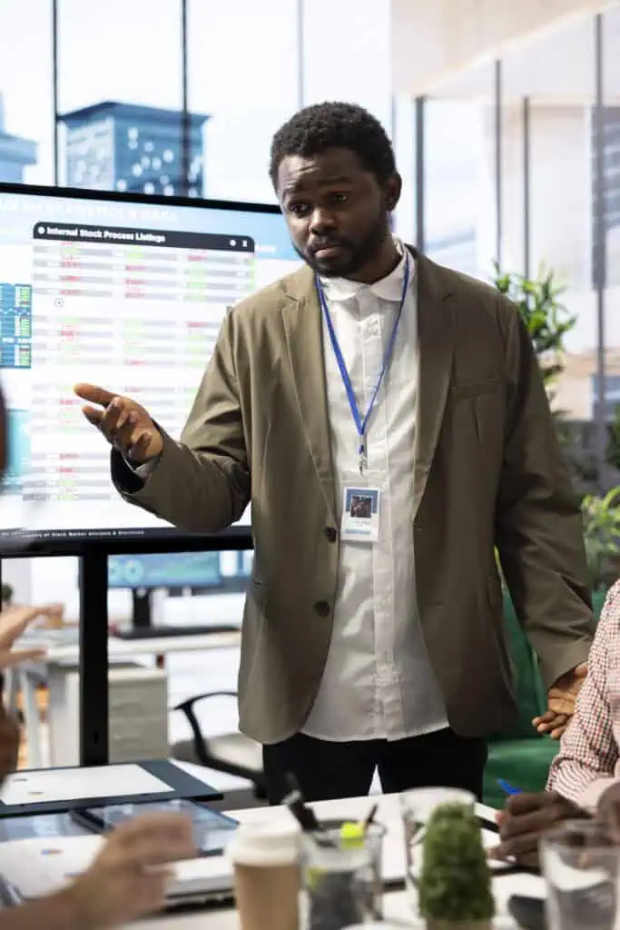 General manager sharing insight on infographics reports in enterprise meeting