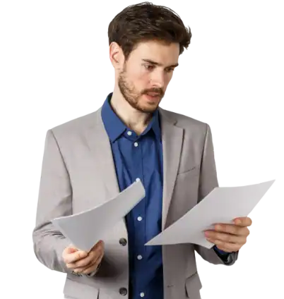 Professional man reviewing documents for interim management solutions.